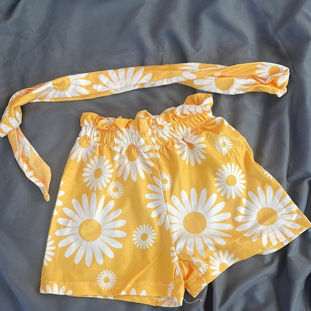 Sunflower shorts w/ matching head tie. Size 3-6 months.